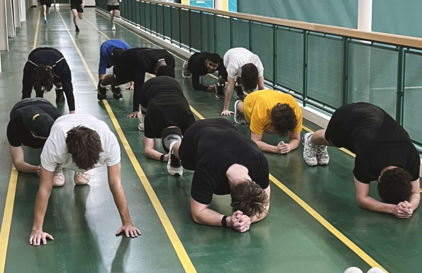 The Saints Men's Baseball team at an early morning working