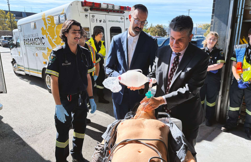 A Paramedic student provides a lesson to MCURES Minister Nolan Quinn and MPP Andrew Dowie