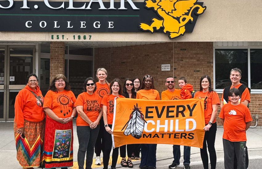 Students, faculty and staff pose at St. Clair College's Chatham Campus