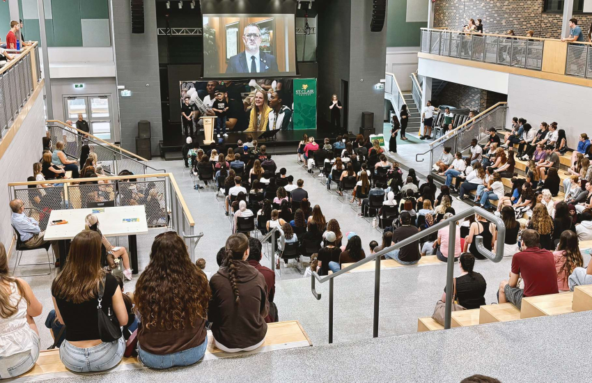 Hundreds of students fill the house at the Student Life Centre for the first session of Fall Orientation