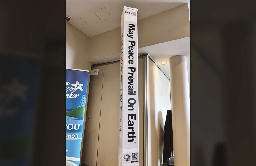 The Peace Pole standing inside the lobby