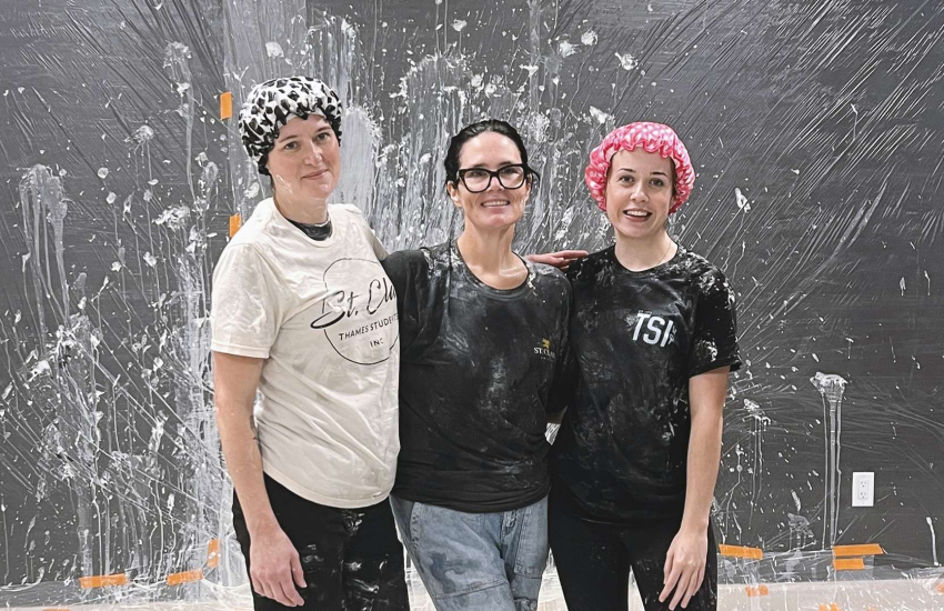 Lindsay Wakem, Dr. Andrea Pepper and TSI President Kaitlynn Byrne pose after getting pied