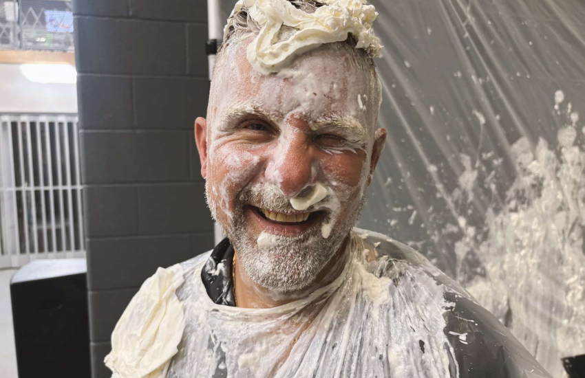 Apprenticeships Manager Nick Hayes shows off his pied face at the Pie the Prof event