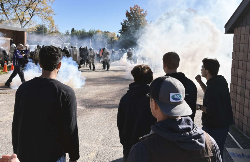 Students watching training exercise
