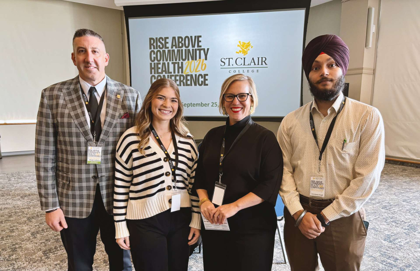 Organizing Committee members Biagio Lattuca and Corrin Primeau pose with two students, Felicity Cavthen and Arshdeep Singh, who won $500 bursaries at the Rise Above Community Health Conference