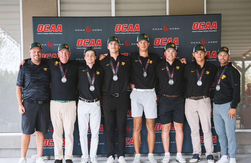 The Saints Men's Golf team poses after winning a team silver medal at the OCAA Golf Championship