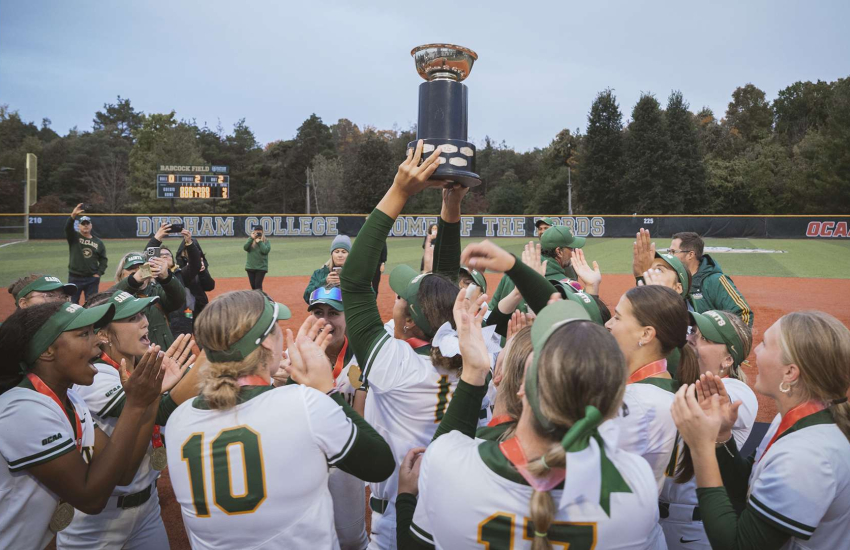 Members of the Saints Women's Softball team celebrates a CCSA National Championship