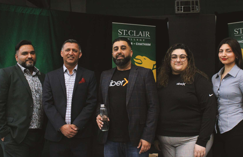 Representatives from siberX, SANS, and St. Clair College pose
