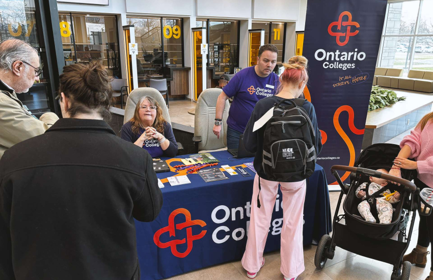 Families speaking with Ontario Colleges in the Patti France Welcome Centre at St. Clair College's Main Windsor Campus during the Spring Open House