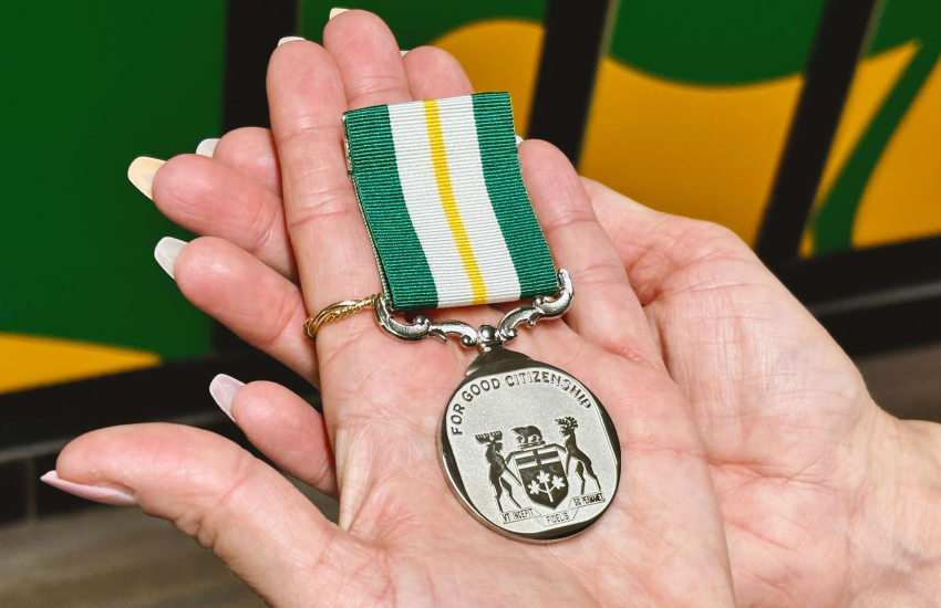 A close-up of the Queen Elizabeth II Medal for Good Citizenship
