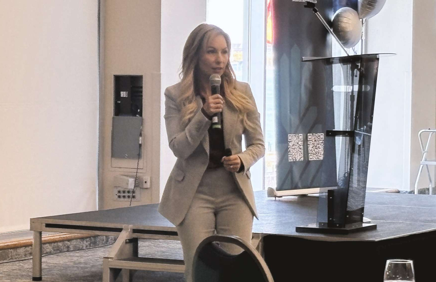 Candice White, CEO of Skilled Trades Ontario, speaks to a crowd