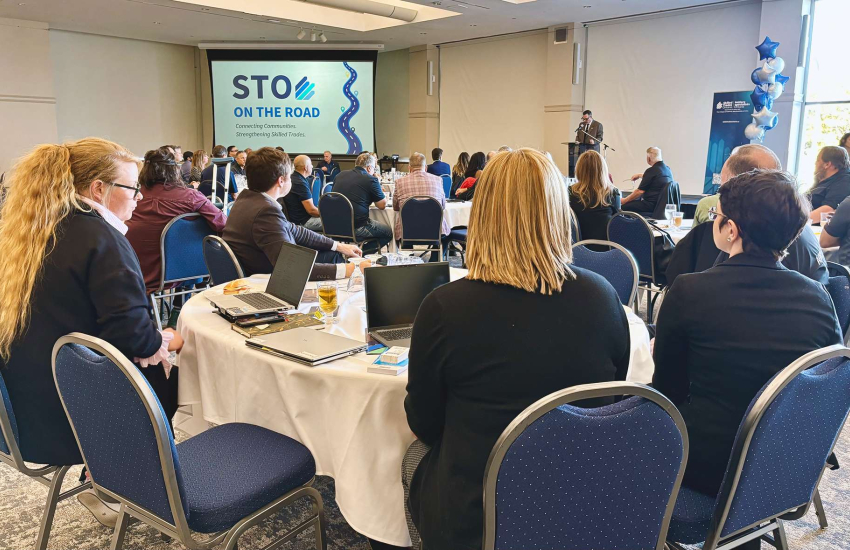 A crowded room gets briefed during the STO on the Road event at St. Clair College