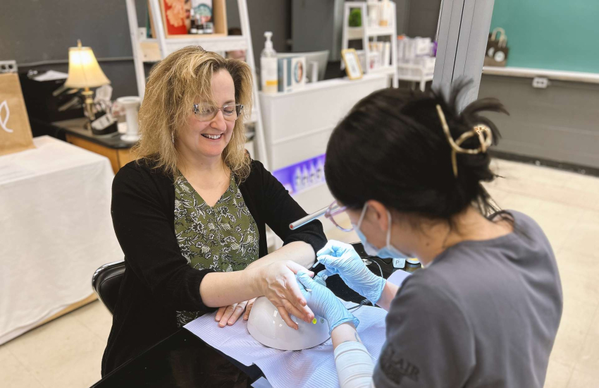 A Windsor Regional Hospital employee receives a complimentary manicure during the Workplace Wellness Program at St. Clair College's Student Spa