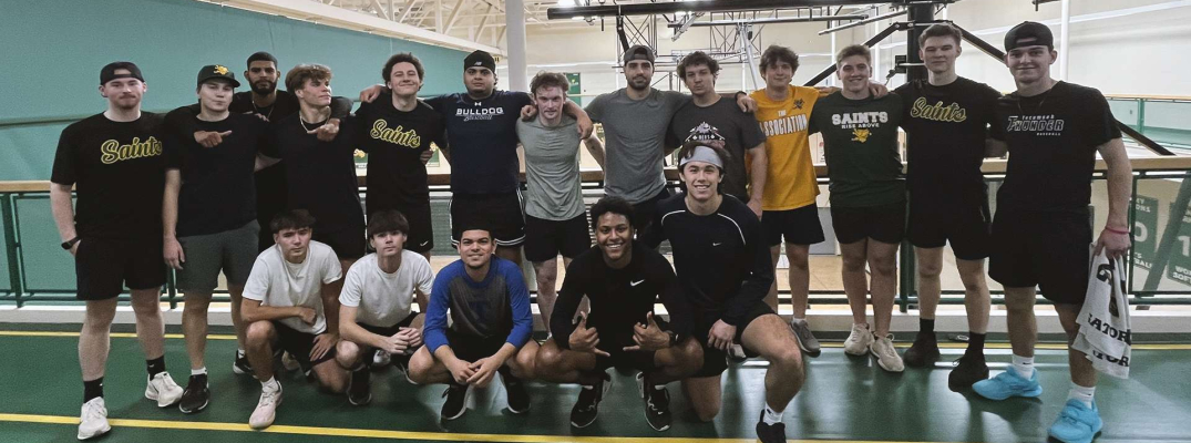 The Saints Men's Baseball team at an early morning working