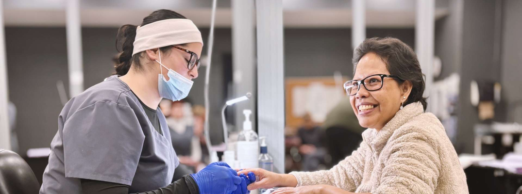 A Windsor Regional Hospital employee receives a complimentary manicure during the Workplace Wellness Program at St. Clair College's Student Spa