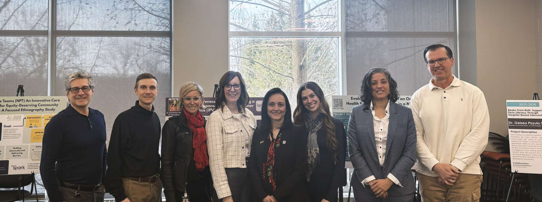 St. Clair College and WE-SPARK Health Institute representatives gather for a photo, capturing the shared commitment to advancing community health through partnership, education, and action.