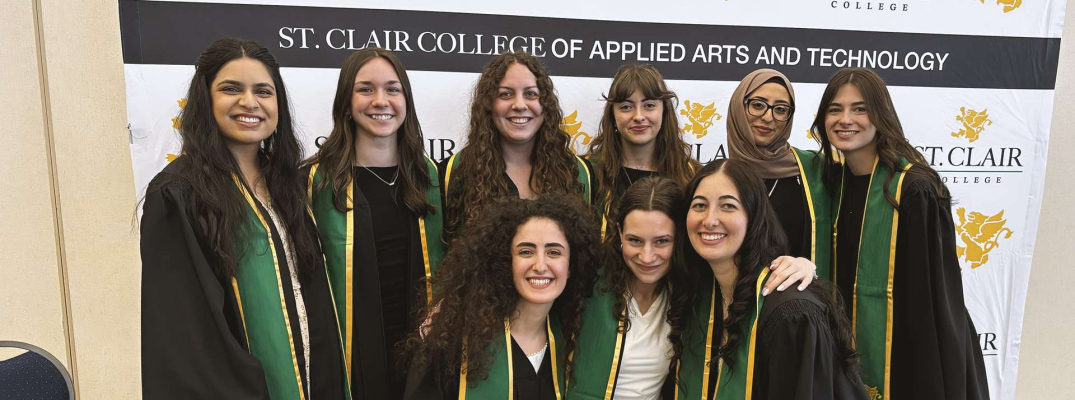 Graduates in the Diagnostic Medical Sonography program pose together for a photo after the 58th annual Winter Convocation