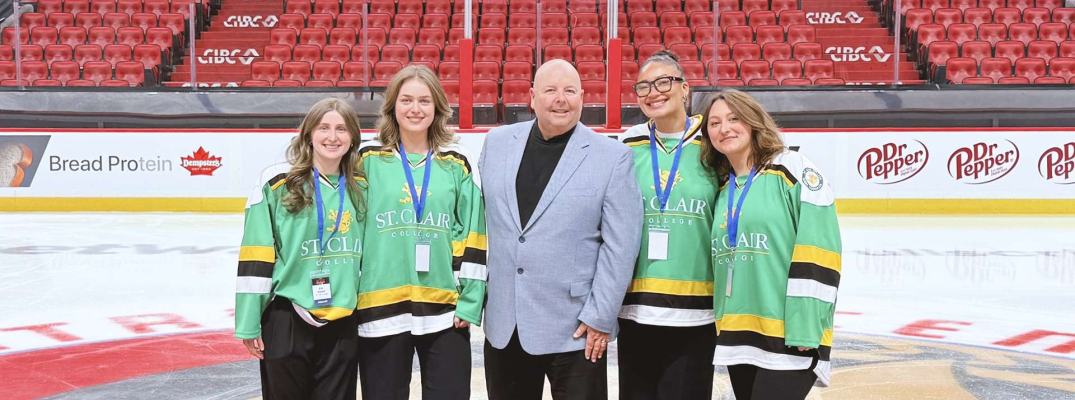 Elle Hebert, Airika Natyshak, Aryanna Pierson, Sausha Goodhand and Prof. Dwayne St. John at the Canadian Tire Centre in Ottawa, Ont. for the NHL Hockey Innovation Competition