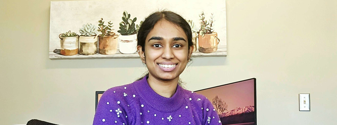 Arya Krishna sitting at her desk at the County of Renfrew in March of 2026. 