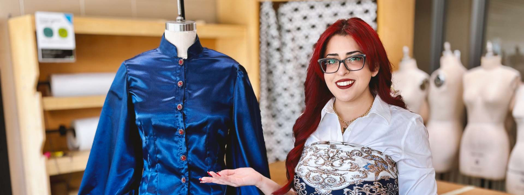 Shahad Al-Haddad, a student in the Fashion Design Technician program