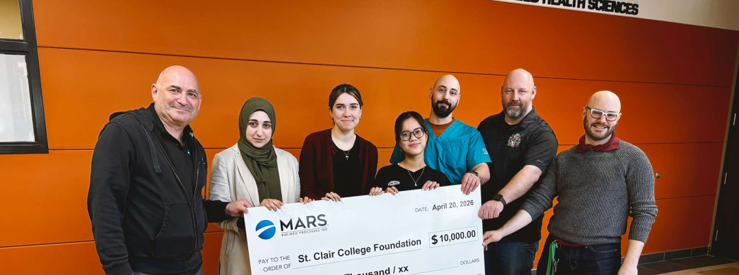 Stu Sinukoff, President of MARS Bio-Med meets with students and faculty in the Biomedical Engineering Technology program to present a scholarship cheque for $10,000.