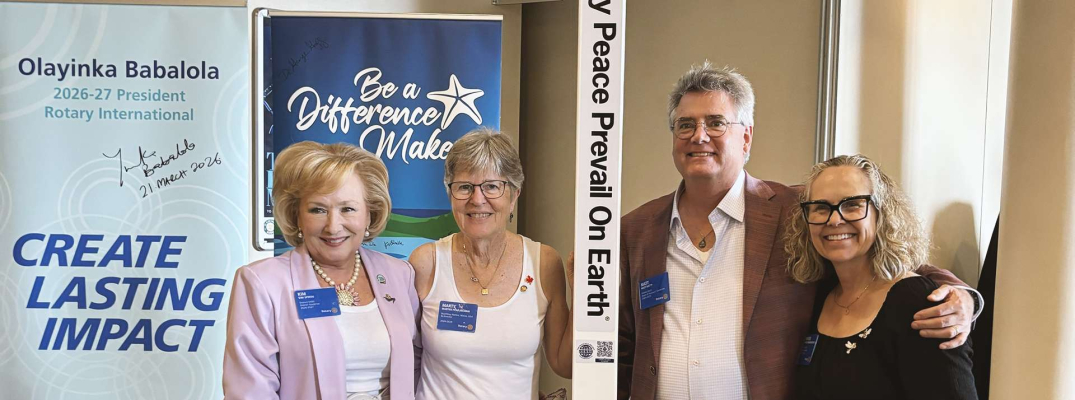 Members of Rotary District 6400 pose with the new Peace Pole