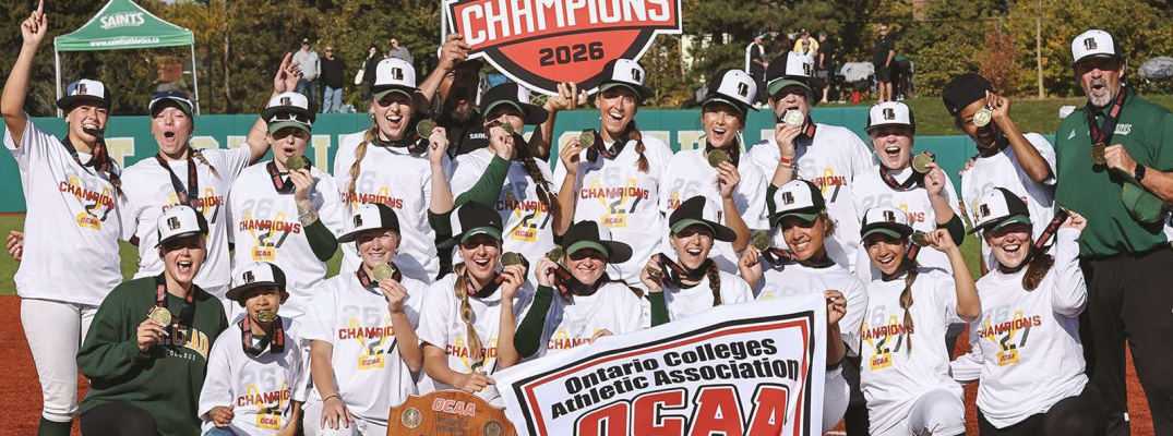 Members of the Saints Women’s Softball team show off their OCAA gold medals after winning the provincial championship