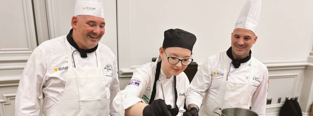 Chef Mike Jimmerfield, Evelyn Rollo and Chef Kris Pieczonka dishing out the St. Clair College Spaghetti Dianne at the Pastabilities Luncheon