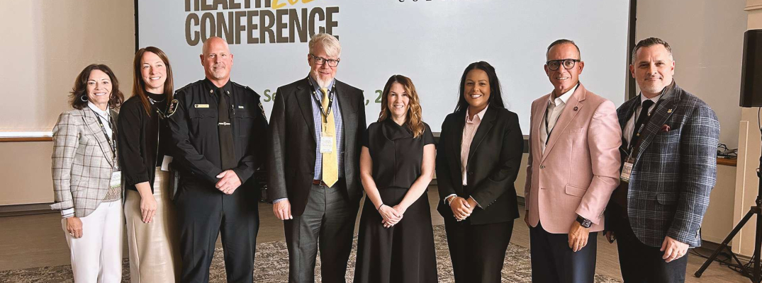 St. Clair College leaders and keynote and session leaders gather at the fourth annual Rise Above Community Health Conference