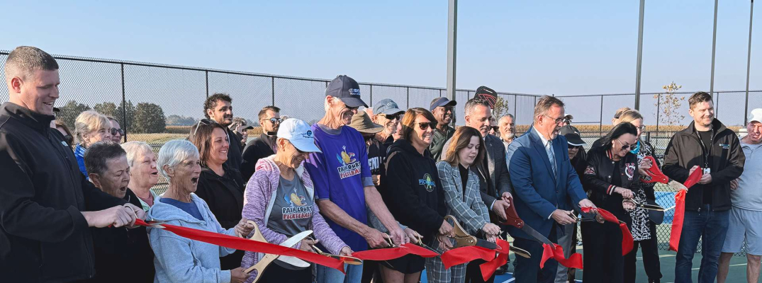 Officials cut the ribbon to mark the end of the second phase of construction at the St. Clair College Community Park