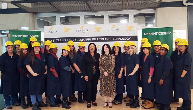 St. Clair College President Patti France poses with the latest group of women in WEST’s Pre-Apprentice program.
