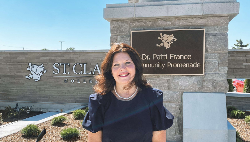 Patti France standing in front of the new promenade.