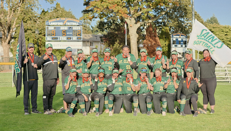 Softball team photo with medals
