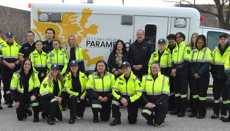 Group photo in front of St. Clair ambulance