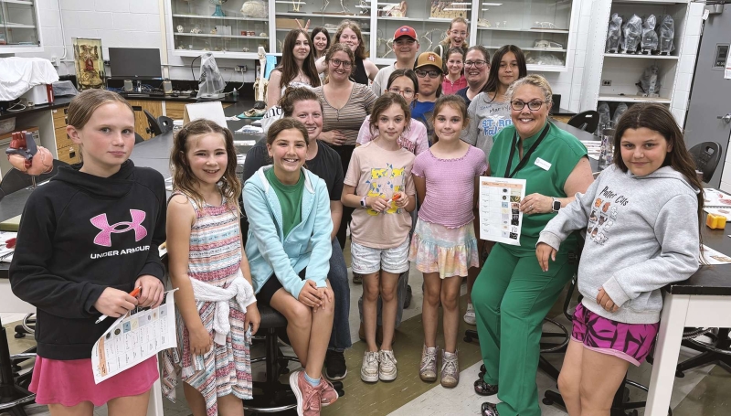 Students in St. Clair College's Veterinary Technician program work with members of the Essex County 4-H Veterinary Club