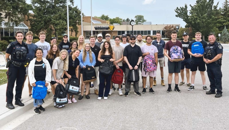 St. Clair College Police Foundations (Fast Track) students are joined by members of the Waterloo Regional Police Service