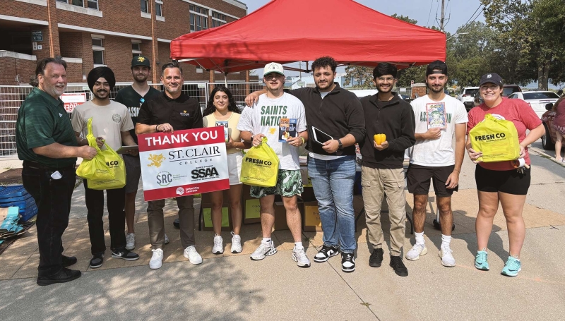 Representatives from the SSAA, SRC as well as College President Michael Silvaggi and Vice President John Fairley join United Way
