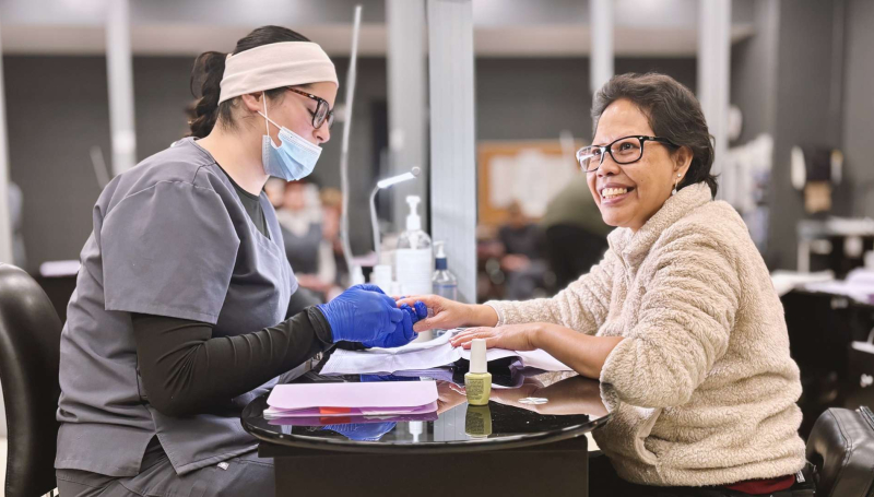 A Windsor Regional Hospital employee receives a complimentary manicure during the Workplace Wellness Program at St. Clair College's Student Spa