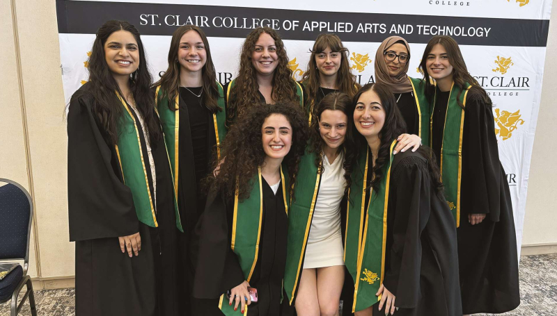 Graduates in the Diagnostic Medical Sonography program pose together for a photo after the 58th annual Winter Convocation