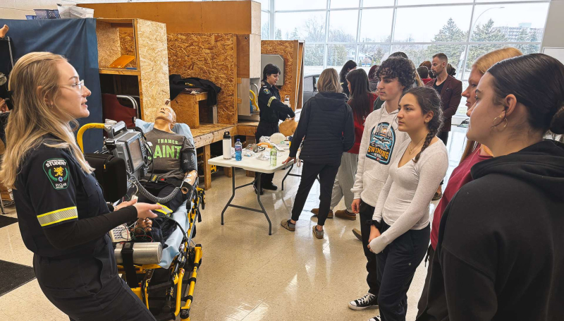 Chatham-Kent High school students with a Paramedic student at St. Clair College's Chatham Campus for Healthcare Horizons
