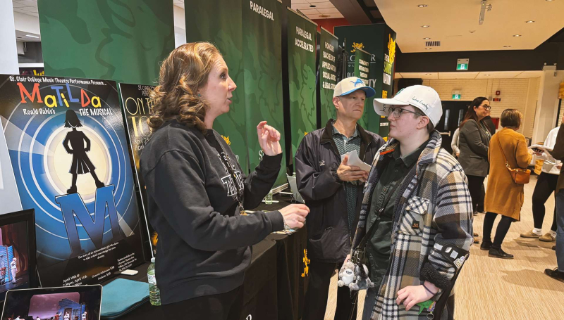 Music Theatre Performance Prof. Kristyn Wiklanski speaks with a prospective student at the St. Clair College Spring Open House at Main Windsor Campus