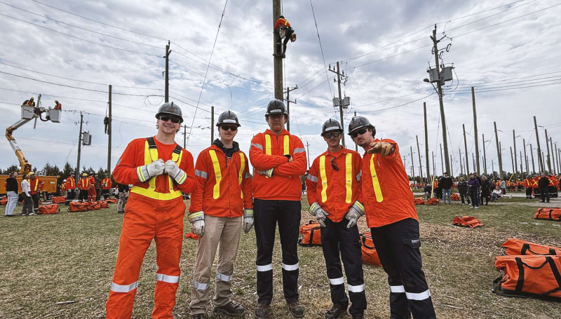Students in the Powerline Technician program at St. Clair College cheering on classmates during the Powerline Rodeo