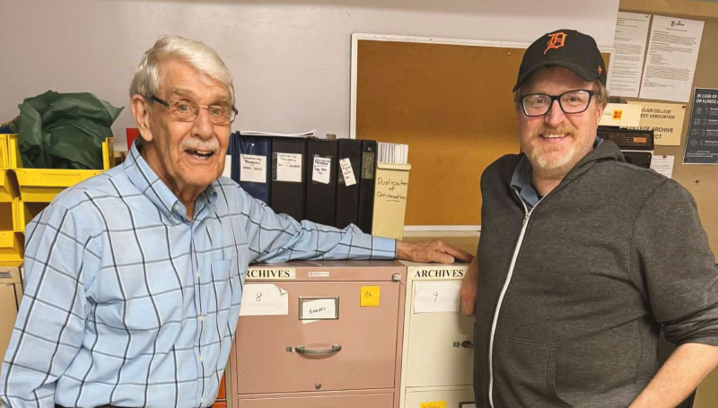Bill Totten and filmmaker Mike Evans meet at St. Clair College's archive room
