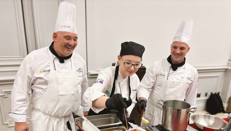 Chef Mike Jimmerfield, Evelyn Rollo and Chef Kris Pieczonka dishing out the St. Clair College Spaghetti Dianne at the Pastabilities Luncheon
