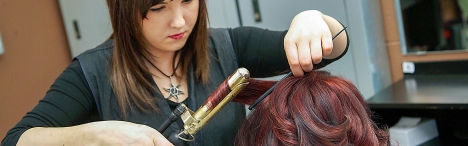 student styling hair