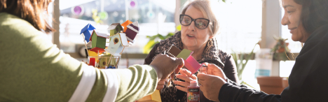 3 elderly women crafting