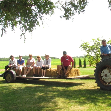 Hibernation Cancellation attendees riding a tractor trailer.