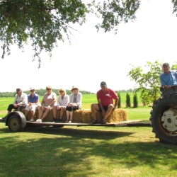 Hibernation Cancellation attendees riding a tractor trailer.