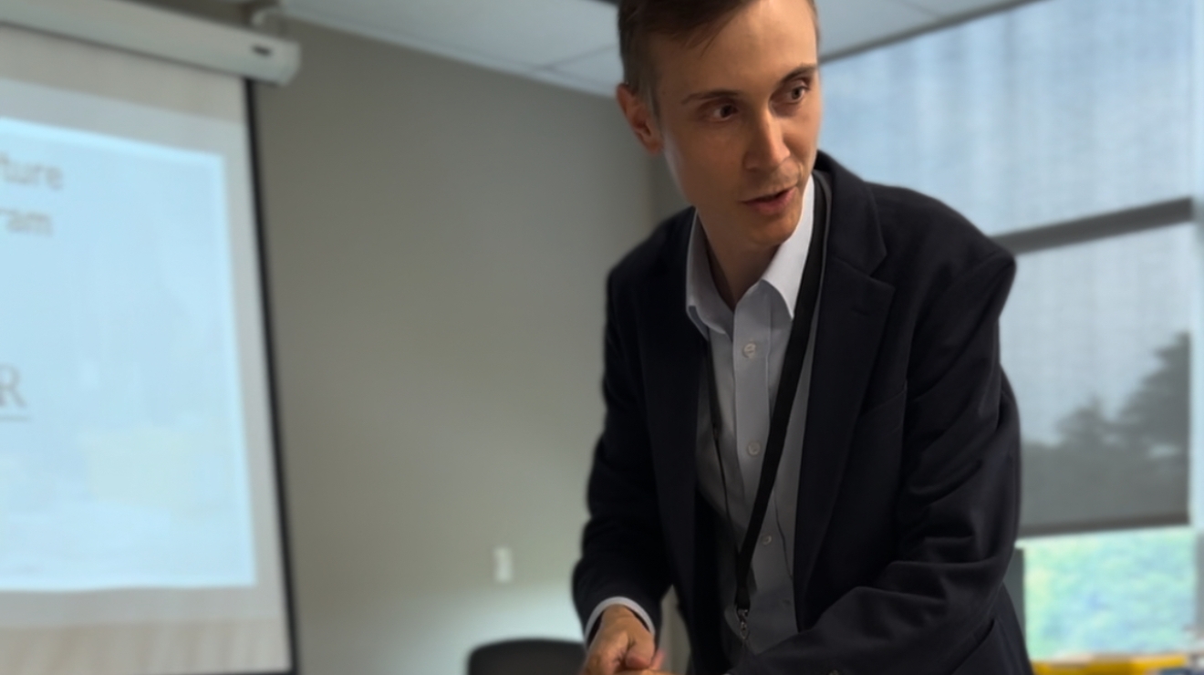 Man looking at others