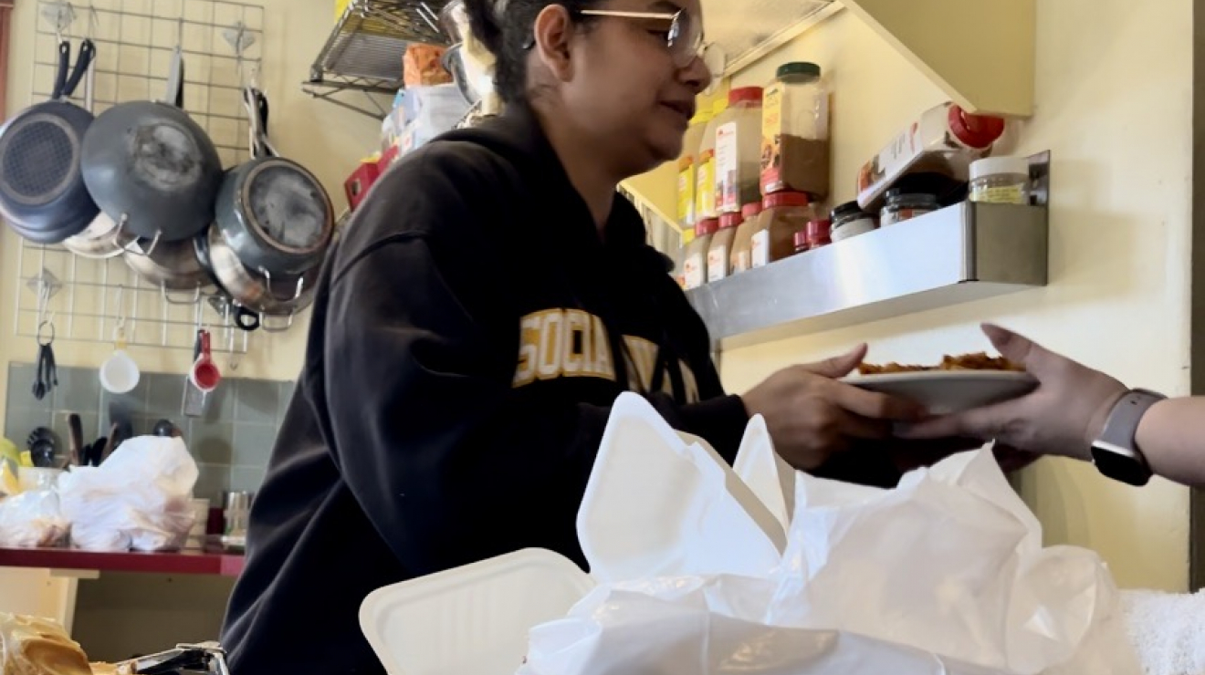 Woman handing out food